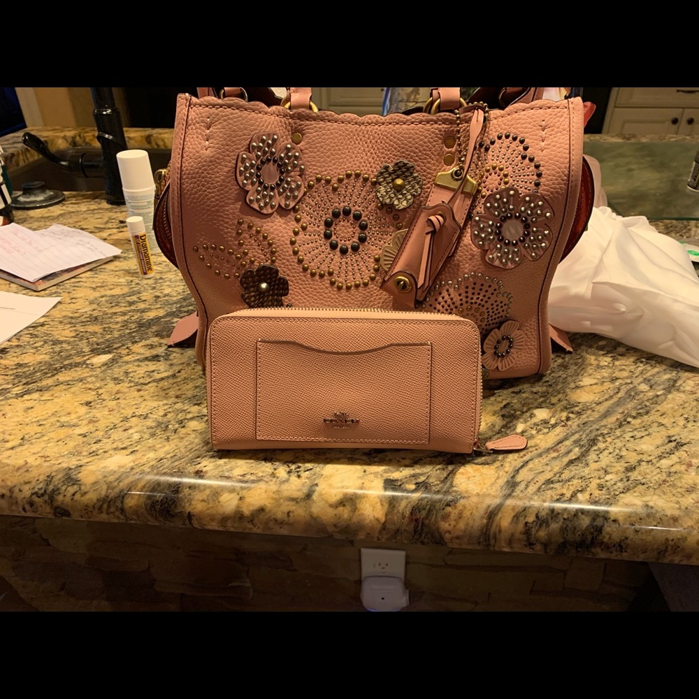 Rogue coach handbag with wallet.